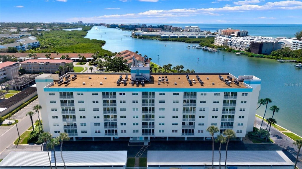 Photo of 10216 Regal Drive #404, Largo, FL 33774 (MLS # TB8557781)