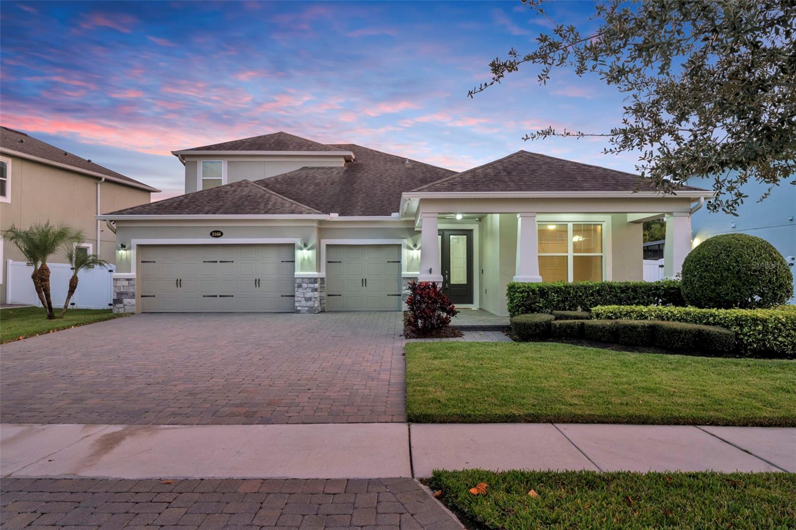 One or more photo(s) has been virtually staged. Welcome to this beautifully appointed executive home in the sought-after Lake Nona area, just minutes from the Lake Nona Medical City complex. With 4 bedrooms, 4 baths, and a 3-car garage, this home combines luxury, comfort, and functionality in everything from the tankless water heater and water filtration system to the spacious and private fenced backyard perfect for outdoor entertaining.
The heart of the home is the expansive kitchen featuring granite countertops, upgraded cabinetry, stainless steel appliances, and a large island with seating — perfect for both everyday living and entertaining. Seamless wood-look tile flooring flows throughout the first floor, complemented by crown molding for added style. A spacious laundry room with a utility sink and cabinets adds convenience, while the freshly painted exterior and charming front porch with a paver driveway enhance curb appeal.
The primary suite, located on the first floor, offers pool views and a spa-like bathroom with dual sinks, a large walk-in shower with dual shower heads, and a massive walk-in closet. The smart three-way split floor plan ensures privacy, with two guest bedrooms and a shared bath at the front of the home, plus a third guest bedroom with its own bath on the opposite side. Upstairs, discover a nearly 600 sq. ft. bonus room featuring the fourth bathroom and storage closet—ideal for a media room, playroom, guest retreat, or a second primary suite.
Step outside to your private backyard oasis overlooking the serene nature preserve. The screened patio showcases a gorgeous heated pool with a large sun shelf, decorative lighting all around, plus a 7-seat jetted spa. The three-way sliders that lead to a covered lanai create the ultimate indoor-outdoor lifestyle.
Set in the gated community of Somerset, residents enjoy a peaceful setting with added security from the gated entrance, a community pool, walking sidewalks, and a playground. All of this is just moments from Lake Nona’s shopping, dining, and world-class amenities.
This home is move-in ready and waiting for you to enjoy the Orlando lifestyle.