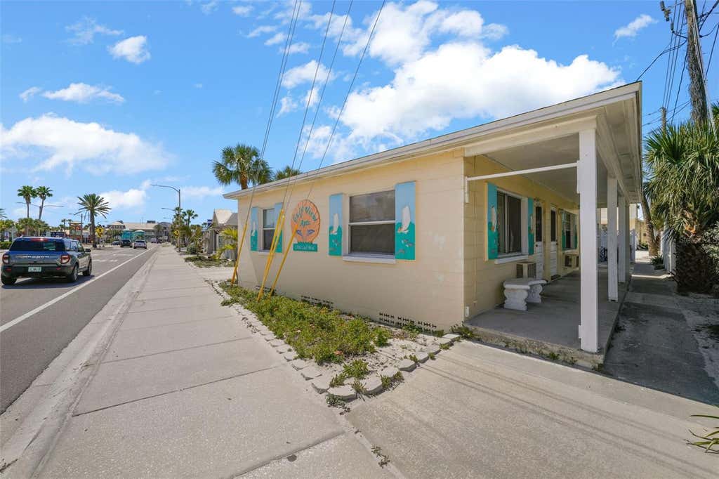 Photo of 13062 Gulf Boulevard, Madeira Beach, FL 33708 (MLS # TB8526028)