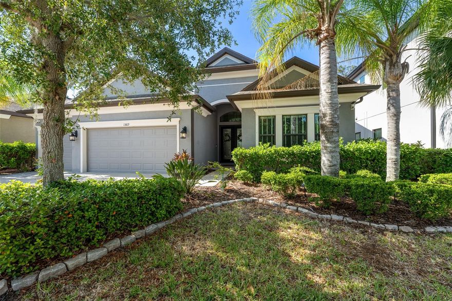 Located within the exclusive gated community of Reserve at SouthFork in Riverview, this exceptional single story residence offers luxury living on a premium homesite with breathtaking, forever-protected preserve views. Featuring 4 bedrooms, a bonus room, 3 bathrooms, a 3-car garage and a resort style pool and spa, this home delivers the perfect blend of elegance, comfort, and functionality. From the moment you step through the double front doors, you’re welcomed by an abundance of natural light, soaring 10–12-foot ceilings and impressive 8-foot doors and entryways that create a grand, open feel throughout the home. Designed with both everyday living and entertaining in mind, the thoughtfully crafted floor plan offers seamless flow between the kitchen, dining, and living areas allowing the heart of the home to feel both spacious and connected. At the front of the home, two generously sized bedrooms share a full bathroom, while the oversized laundry room is truly a standout feature with custom built-ins, Quartz countertops, a desk area, additional storage and a separate sink station. Just beyond the dining room, the versatile bonus room—currently used as an additional bedroom—offers endless possibilities and is conveniently positioned next to a full bathroom with direct pool access. Privately tucked away, the luxurious primary suite serves as a peaceful retreat overlooking the pool and preserve. The suite features dual walk-in closets and a spa inspired ensuite bath complete with separate vanities, a soaking tub, private water closet and an upgraded walk-in shower with jets. Step outside to your own private backyard oasis featuring a heated saltwater pool and spa, covered lanai, and upgraded no-see-um super screen enclosure perfect for enjoying Florida living year-round in total comfort and privacy. Additional upgrades include Cat 5 wiring throughout every room, prewiring for security at the lanai, front door, and windows, plus custom shelving in all closets as well as new luxury vinyl flooring and a new water heater. Rarely does a property combine this level of privacy, functionality and luxury with such stunning preserve views. This is truly a one of a kind opportunity to experience resort style living every single day.