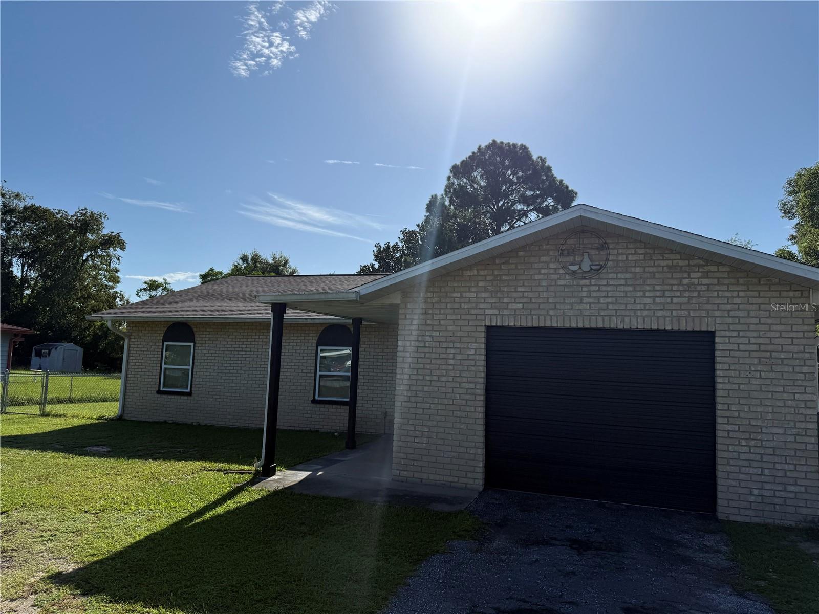 Very Nice three bedrooms 2 baths with one car garage . This property have been freshly painted, it has a new fairly new kitchen with tall cabinets, the whole house will have ceramic tile, also the property is fence with chain link. Close to shopping and transportation and schools.