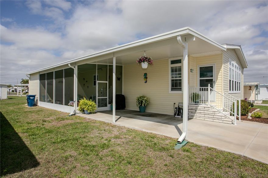 Imagine waking up each morning in a nearly new 2022 manufactured home, sunlight pouring through the windows of your open floor plan as you sip coffee or in the private screened lanai designed for easy, comfortable Florida living. Your day starts slowly here. Maybe a walk with your small pets, maybe a quiet moment on the porch—because this 55+ land-owned co-op community was built for those who want more than a home… they want a lifestyle. 

Inside, you’ll love the modern construction built to current hurricane codes, the convenience of inside laundry and the surprise of a walk-in pantry that keeps everything organized and within reach. It’s the kind of home that feels effortless, whether you’re here full-time or enjoying the perfect seasonal retreat. 

Step outside and you’re part of a warm, welcoming community where neighbors’ wave, activities are planned, and the community pool and amenities make it easy to stay active and connected. With a $300 monthly fee covering water, sewer, trash, cable TV, high-speed internet, ground maintenance, recreational facilities, private roads and more. You get the freedom to enjoy life without constant upkeep. 

And when you’re ready to explore, you’re minutes from I-75, SRQ and Tampa airports, VA facilities, medical offices, restaurants, entertainment and the upscale UTC Mall. Everything you need, shopping, dining, healthcare, travel, is right at your fingertips. 

This is the perfect place for someone who wants a newer home, a friendly community, and a low-maintenance lifestyle in one of the most convenient locations in the Bradenton–Sarasota area. Here, life feels easier, brighter, and more connected. Exactly the way Florida living should be.