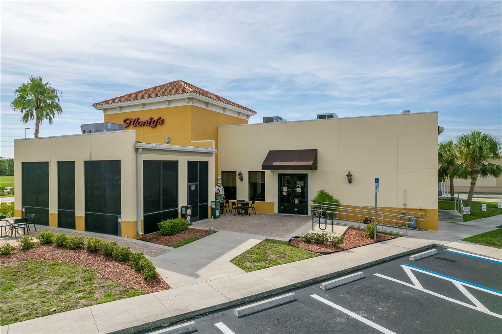 PRIME LOCATION in the City of Punta Gorda. NO HURRICANE DAMAGE OR FLOODING.This purchase includes the Building and Land ONLY. The building sits on .84 of an acre. Located directly on North/South US Route 41 with approximately 307 ft. of frontage visibility and two separate access points; US 41 South and Vasco Street. Built in 2013 approximately 4300 +/- single level sq. ft. meeting the current hurricane codes with high impact hurricane proof windows and doors. Current use is a highly regarded restaurant seating for approximately 168 with an indoor and outdoor patio full bar. The outdoor patio dining/ bar area has a separate HVAC unit and screen closed with vinyl coverings. Other building features are various height ceilings, an abundance of natural lighting, an interior storage room, private office space, attached enclosed exterior storage (currently used for two walk-in coolers), and separated from the building an aesthetically appealing dumpster enclosure. This FREESTANDING building has endless possibilities, whether you are looking for a restaurant OR desire a custom remodel. Currently the site offers 42 parking spaces with handicap accessibility which is ideal for a Medical Office, Retail, Office Spaces, etc. Respectfully, please DO NOT contact current occupants or disturb during business hours.