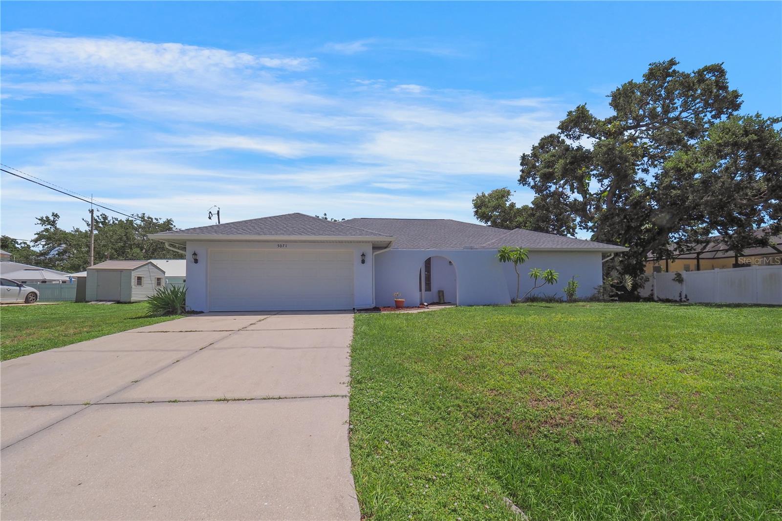 Lovely 3-bedroom, 2-bath home perfectly situated between Venice Beach and Manasota Key, just a short 10-minute drive to the pristine Gulf beaches. This home features a split floor plan with tile flooring throughout, inside laundry room, freshly painted inside and out, and updated with a newer roof and gutters. Start your mornings with coffee on the spacious screened lanai, no HOA restrictions, and not in a flood zone. Whether as a full-time residence or seasonal retreat, this property is ready to welcome its new owners. You can look for shark teeth, listen to a drum circle, or join a yoga session on Venice’s beaches. Venice is also home to one of Florida's few dog beaches! Easy to show—schedule your tour today!
