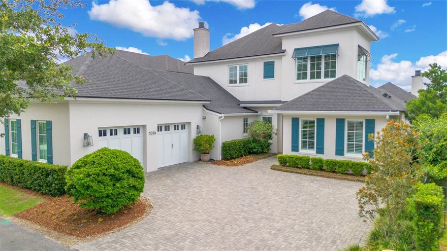 EXCLUSIVE LAKE LIVING IN BALDWIN PARK. Step into the world of luxury living in Baldwin Park and discover this oasis that awaits you. This waterfront masterpiece, built in 2020, offers stunning lake views, exceptional craftsmanship, by Cahill Homes and a well-thought-out floor plan. Enjoy the tranquility of overlooking Lake Susannah and the adjacent park from the outdoor space of this home. Perfect for entertainment or relaxation, the outdoor living areas are enclosed with motorized retractable screens, a gas fireplace, a summer kitchen, and a saltwater pool with a sun shelf. An expansive travertine paver deck is enclosed with an aluminum picket fence and lush landscaping. Artificial turf allows for maintenance free green space. A private gate and wall provide access to the linear park and extensive trail network throughout the neighborhood.
<br></br>
Upon entering the bright and open living space with a gas fireplace and custom built-ins, you'll be greeted with sliding glass doors that frame views of the outdoor living space, pool, and the serene lake beyond. A private front-facing office/flex room with barn doors offers an ideal workspace. The impressive kitchen boasts a large quartz island and Monogram appliances, including a 6-burner gas cooktop, two ovens, 48” refrigerator and freezer, and a wine refrigerator. The back kitchen is equipped with a second prep sink, full dishwasher, and floor to ceiling pantry cabinetry.
<br></br>
The first-floor primary bedroom features pool and lake views, a luxurious custom closet with an island and spa like primary bathroom. A second bedroom downstairs with en-suite bathroom is presently used as a craft room but easily coverts to a convenient space for guests. Expansive staircase tucked behind the kitchen provides access to the second floor offering three bedrooms, a powder bath off the bonus room, and a second laundry room. The game room with vaulted beam ceilings is filled with natural light, custom built-ins, a wet bar complete with mini-refrigerator and dishwasher. Triple windows provide a long view over Lake Susannah.
<br></br>
The oversized 2-car garage features insulated garage doors, epoxy floor and tons of storage cabinets.  Walking distance to Village Center featuring Publix, casual dining and new high-end restaurants Camille and Sorekara. Bike to East End market, Winter Park’s Park Ave., and short drive to downtown Orlando and Orlando International Airport.
<br></br>
<div style="padding:56.25% 0 0 0;position:relative;"><iframe src=https://my.matterport.com/show/?m=uRQFyWrkNgQ&mls=1 frameborder="0" allow="autoplay; fullscreen" allowfullscreen style="position:absolute;top:0;left:0;width:100%;height:100%;"></iframe></div>