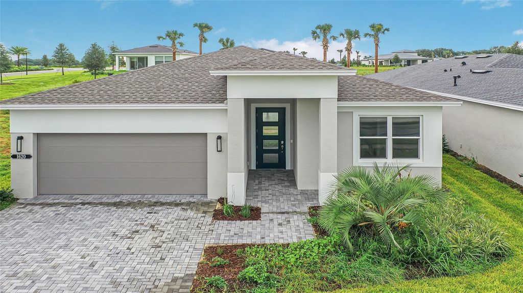 Photo of 1620 Bellagio Loop, Tavares, FL 32778 (MLS # W7880643)
