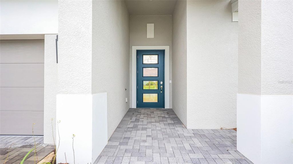 Photo of 1620 Bellagio Loop, Tavares, FL 32778 (MLS # W7880643)