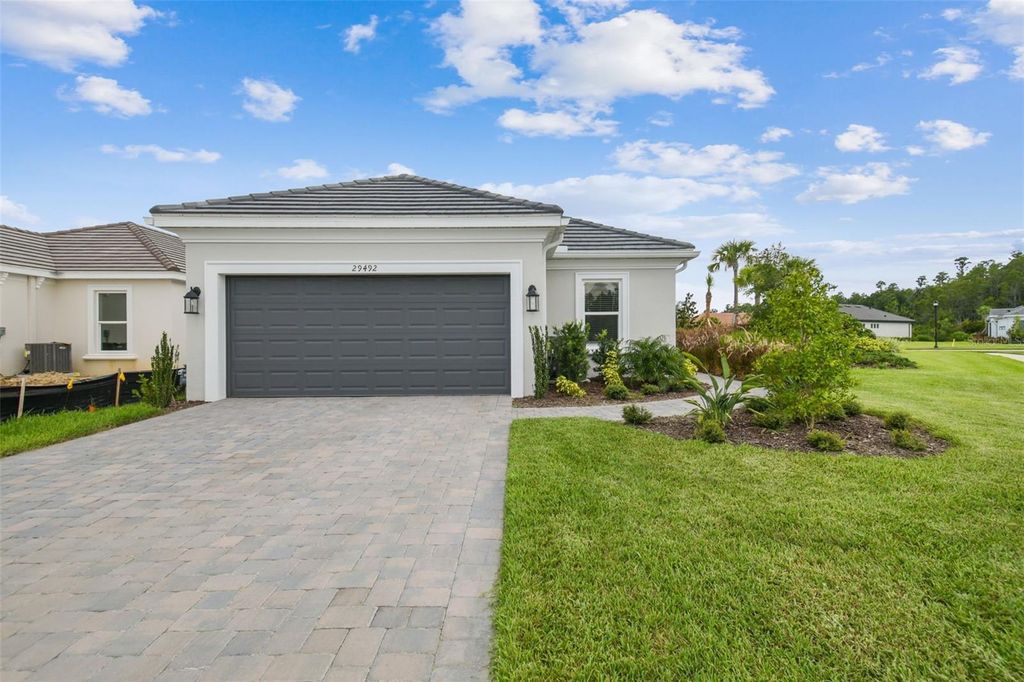 Photo of 29492 Zupetta Lane, Wesley Chapel, FL 33543 (MLS # TB8413289)