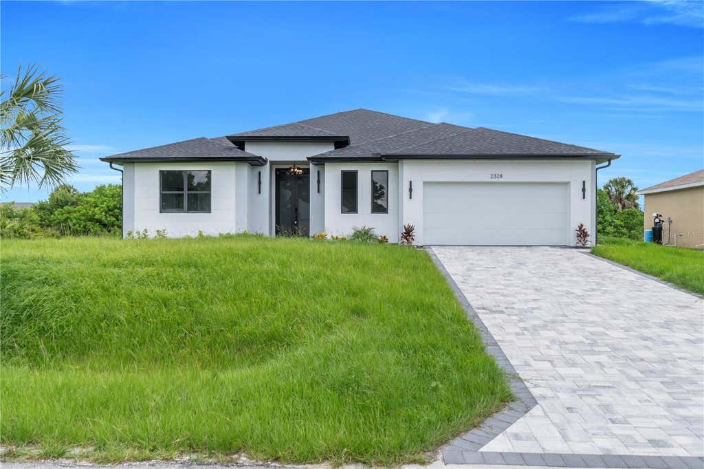 Photo of 2328 Irondale Rd, North Port, FL 34287 (MLS # TB8522248)