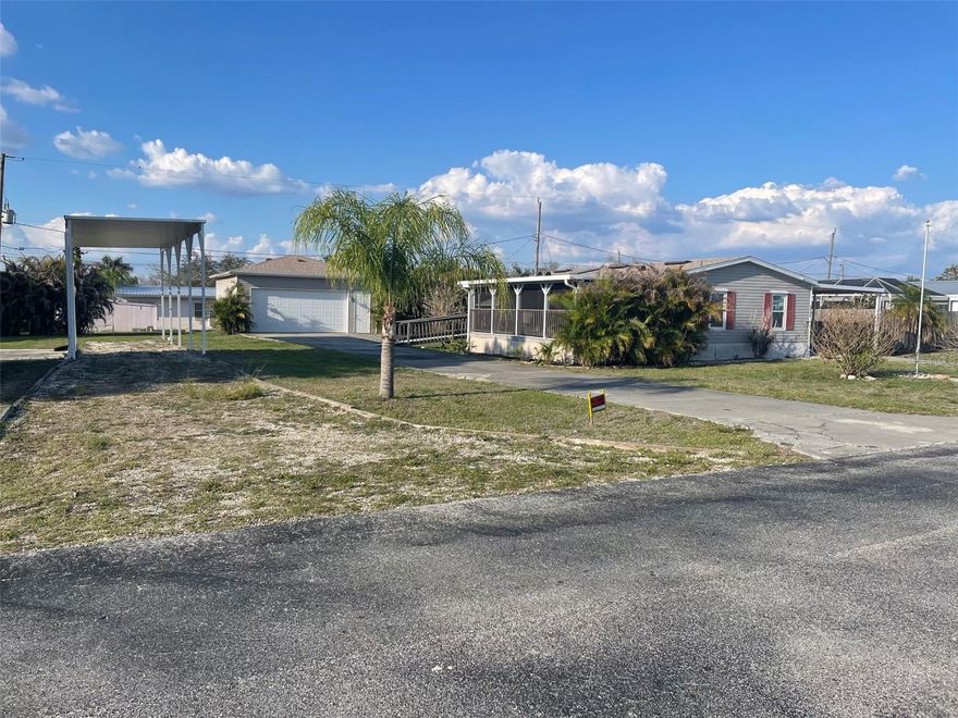 Great Mobile home in desirable area. Welcome to your dream home in the peaceful and serene Peace River Association community! This beautiful manufactured home boasts 2 bedrooms, 2 bathrooms, and a spacious 2 car garage. The community pool is perfect for relaxing and enjoying the warm Florida weather. The kitchen features elegant Formica counters and white appliances, creating a modern and inviting space for cooking and entertaining. The cozy carpet throughout the home adds a touch of comfort and warmth. This 55 plus community offers a tranquil and welcoming atmosphere, perfect for those looking to enjoy their retirement years in style. The property is situated on two lots, providing ample space and privacy. Covered RV parking, a two-car garage, and a carport offer plenty of room for all your vehicles and outdoor toys. The skylight in the kitchen fills the space with natural light, creating a bright and airy ambiance. With a public golf course nearby, you'll have plenty of opportunities to enjoy the great outdoors and stay active. Don't miss out on this fantastic opportunity to own a piece of paradise in Peace River Association! The HOA membership is optional.
