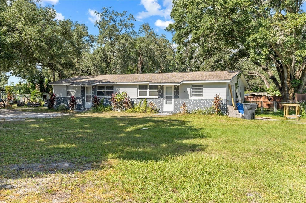 Photo of 5012 12th Avenue S, Tampa, FL 33619 (MLS # TB8516102)