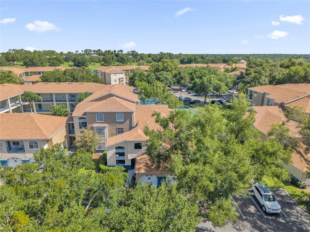 Photo of 7300 Westpointe Boulevard #717, Orlando, FL 32835 (MLS # O6425277)