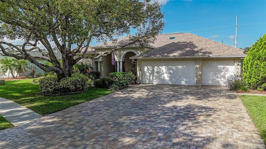 Welcome to Silver Oaks, where charm and comfort meet golf-course living! A newly sealed pavered drive, lush landscaping, and an expanded front entry greet you with warmth and style. Step inside to a bright living and dining room where sliding glass doors frame a stunning view across the pool lanai and out to the rolling greens.  The heart of the home is the beautifully remodeled kitchen (2014), designed with both function and flair. Expansive quartz counters, upgraded cabinetry with spacious under-counter drawers, lighted accent cabinets above, and a walk-in pantry provide all the storage and prep space you could dream of. Cooking is a delight with the induction range (new in 2024), and newer French doors open directly to the pool lanai—perfect for entertaining! The kitchen flows into a comfortable family room, also with sliders to the pool, keeping the indoor-outdoor living seamless.  The primary suite is a true retreat, featuring a walk-in closet plus a second closet for extra storage. The ensuite bath offers double sinks, a walk-in shower, and a relaxing jetted tub with natural light pouring through a large window. Bedrooms 2 and 3 are tucked behind a stylish barn door with a shared bath, while Bedroom 4 sits at the rear with access to Bath 3, which also serves as the convenient pool bath.  Step outside to your screened lanai—complete with a pool, spa, outdoor kitchen, and grill—all overlooking the tranquil golf course. For peace of mind, the lanai features a hurricane screen.    Well-maintained and move-in ready, this home also includes: exterior painted (2021), new front door (2019), seamless gutters with leaf protection (2022), new roof and skylight (Aug 2022), driveway pavers replaced in 2019 and resealed/sanded in 2025.   Silver Oaks is loved for its tree-lined streets, golf-cart lifestyle, and unbeatable location near shopping, dining, Advent Health hospital, and historic downtown Zephyrhills. Don’t miss this inviting home that blends updates, style, and a fabulous pool-side view of the greens!
