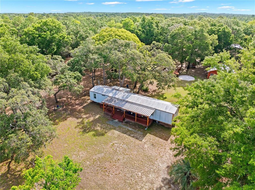 Photo of 8378 Grove Road, Brooksville, FL 34613 (MLS # TB8513757)
