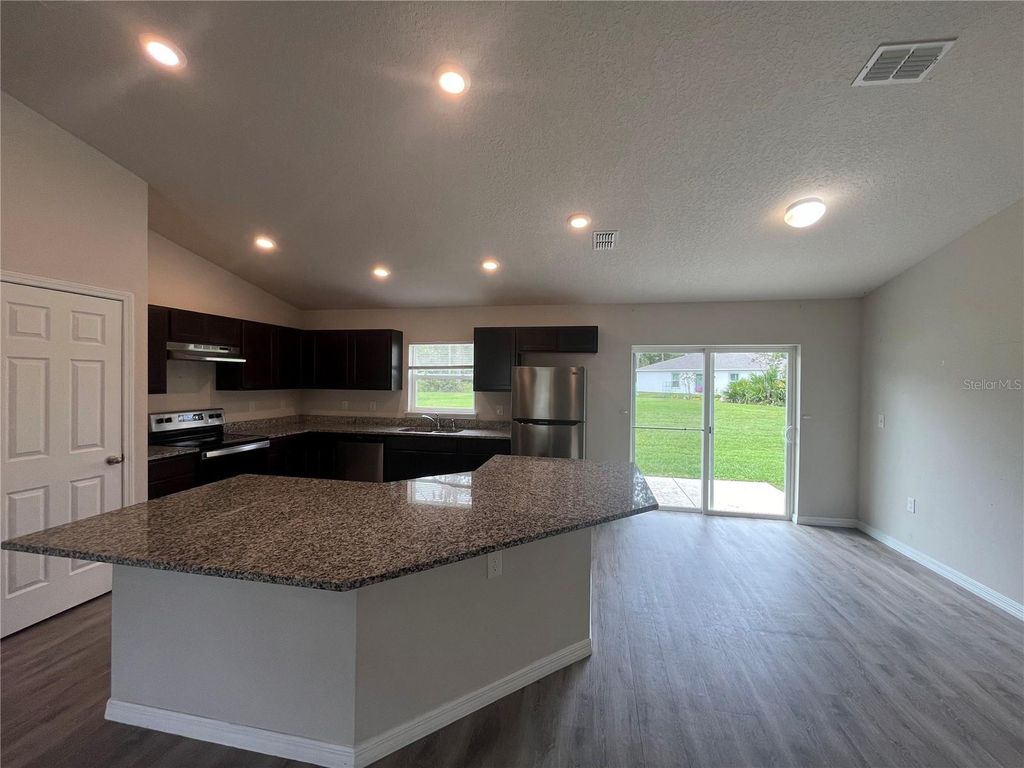 Photo of 132 Point Pleasant Drive, Palm Coast, FL 32164 (MLS # FC313191)