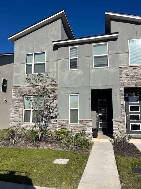Photo of 1672 Tropical Palms Circle, Kissimmee, FL 34747 (MLS # S5123092)