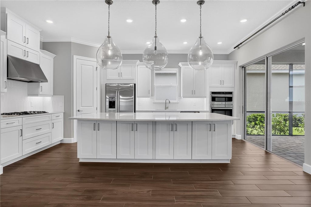 Photo of 936 Arbor Green Trail, Saint Cloud, FL 34771 (MLS # O6382286)