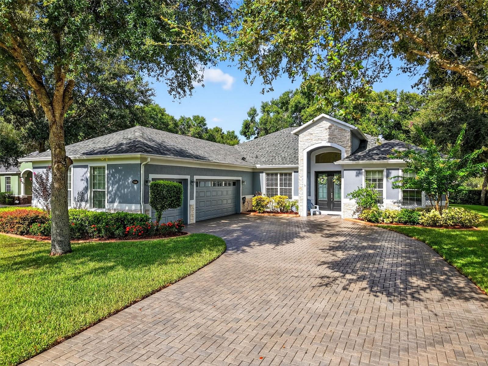 Sprawling, ideal floorplan, single story with split bedroom configuration; 4-bedroom 3 bath M/I home Berkley II model. Fresh exterior paint, custom pavers, corner fenced lot with an oversized 3 car garage with opener leads to interior utility room with washer, dryer and more storage. Double designer exterior doors bring you to the tiled foyer with a private office with French doors. A large formal dining room is convenient to the spacious kitchen and huge family room making it ideal for entertaining. The kitchen has granite surfaces, an electrical outlet for every counter appliance possible, stainless-steel appliances, large island with seating and so much pantry storage that covers an entire wall in the breakfast nook. Open, bright and inviting family room opens to the large, newly expanded screened porch that is like another room. The porch has a serene, private view of the fenced rear yard. Large secondary bedrooms are nestled on the other side of the home providing privacy and storage in their closets. Primary PRIVATE suite offers two large closets, sitting area with sliding glass doors, spa-inspired, large bathroom with garden tub and separate shower, dual vanities. Many upgrades include: expanded screened porch, interior paint, landscaping, new roof 8/2024, electrical panel, and wired for a generator, new AC 1/27/23, and hot water heater 11/08/22. Just bring your lifestyle, people, pets, and dreams to this wonderful community and home.
