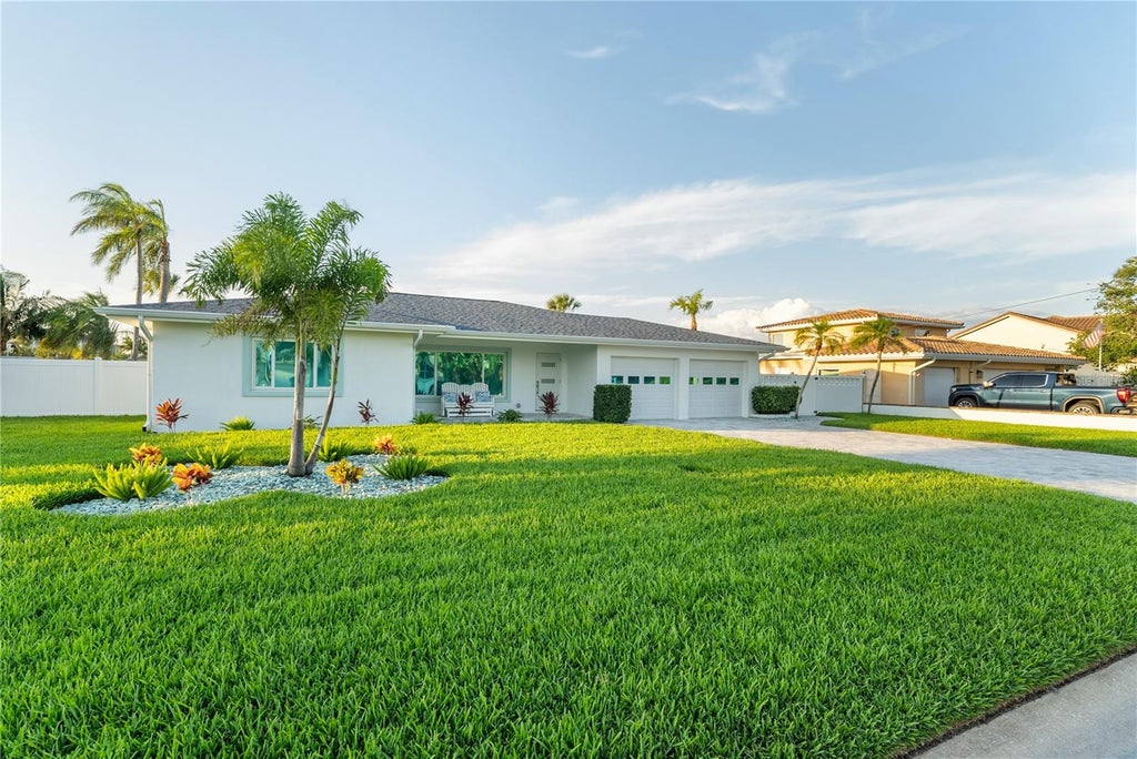 Photo of 227 Howard Drive, Belleair Beach, FL 33786 (MLS # TB8545202)
