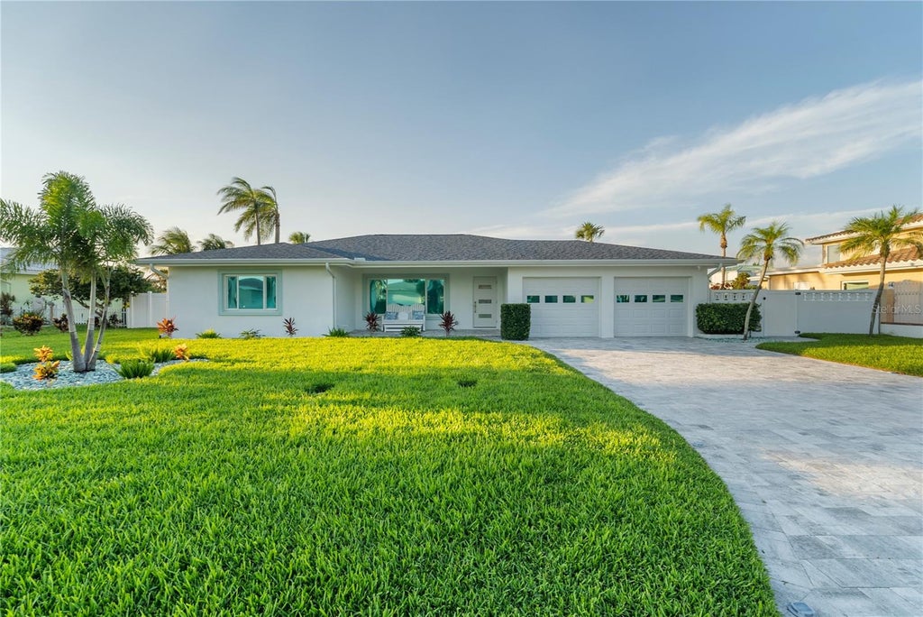 Photo of 227 Howard Drive, Belleair Beach, FL 33786 (MLS # TB8545202)