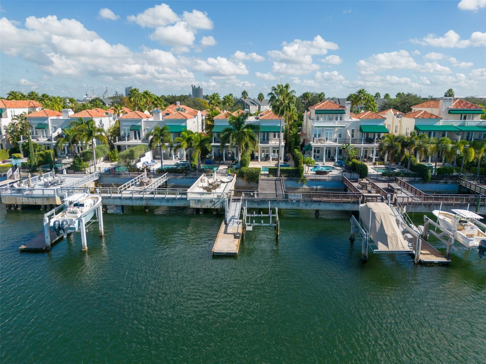 Property 1147 Abbeys Way, located in Tampa, FL, is an exquisite waterfront home. Boasting one of the largest private decks on Abbeys Way, you will have direct deep water access for a boat with the included boat lift. This stunning residence offers a spacious and comfortable living experience with a recently renovated kitchen, outdoor patio and updated pool, and newly finished pathway to the pool with landscaping. The exterior of the home has been newly painted to an updated modern color and the two car garage has a new storage rack system to allow for easy organization of your belongings. The private community of Harbour Island provides 24/7 security giving you a secure place to call home just minutes from downtown Tampa.