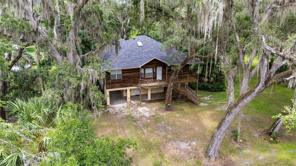 Photo of 2299 N Bayou Point, Inverness, FL 34453 (MLS # OM728101)