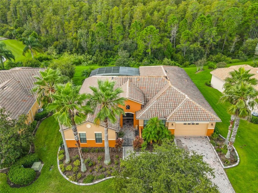 STUNNING BILTMORE model w/ 3110 SF on a quarter acre CONSERVATION lot in the Portofino subdivision. Walk through the COURTYARD & enter through the FRENCH DOORS to view this magnificent home! Beautiful VIEWS of CONSERVATION from the OVERSIZED & TILED LANAI that is SCREENED & Partially Covered. Two HVAC Systems (new in 2021 & 2022).  Seller wants to sell UPDATED FURNITURE with home for a fee. Some exclusions apply. UPGRADES INCLUDE: 8' doors, ROUNDED CORNERS & 5.5" BASEBOARDS throughout. CERAMIC TILE in main living areas, bathrooms & laundry, Lanai. CARPET in bedrooms. Kitchen Features: STAINLESS STEEL APPLIANCES, Built In DOUBLE OVENS, Cooktop Range with Vent Hood, GRANITE COUNTERS, 42" Soft Close Upper Cabinets, PULL OUTS in lower cabinets, RECESSED LIGHTING & WALK IN PANTRY. Dining Room features DOUBLE TRAY CEILING & large chandelier.  PRIMARY Bedroom boasts a TRAY CEILING, CROWN MOLDING, SITTING AREA , 2 WALK IN Closets & access to the lanai. PRIMARY BATHROOM: 2 RAISED VANITIES w/ GRANITE Counters, Soaking Tub, stand alone shower & Linen Closet. CEILING FANS in major rooms. HUGE FLEX ROOM with French Doors leading to the Courtyard. Easily can be used as an office w/ private entry. DUAL PANE WINDOWS. 2" Faux BLINDS throughout home. LAUNDRY RM has GE Washer/Dryer, Sink w/ Cabinet, Overhead Cabinets & Closet.  Bedrooms 3 & 4 boasts a JACK & JILL BATHROOM w/ raised Vanity & GRANITE top. Also, Tub/Shower & comfort height commode. 3rd FULL Bathroom features RAISED VANITY w/ GRANITE Top, HYDROTHERAPY JETTED TUB w/ Shower. & access to the Lanai.  2nd Bedroom has Conservation Views!  WHOLE HOUSE WATER SOFTENER.  BARREL TILE ROOF. **See the FULL LENGTH VIDEO on Tour Link 1.** ***Solivita is an active adult 55+ community located in Kissimmee, Florida. It is approximately 50 minutes from Disney World & the Orlando International Airport. Solivita has a total of 5,470 homes. Approximately 10,000 - 11,000 people live in Solivita during the winter while approximately 7,500 live in Solivita during the summer. Enjoy your active years in paradise. Solivita's amenities include: - a manicured SOFTBALL diamond & field - 36 holes of CHAMPIONSHIP GOLF either as a paid member of Stonegate Golf Club or pay as you go - 2 STATE of the Art AMENITY centers with updated exercise equipment, yoga studio & meeting rooms - 3 restaurants - 14 HEATED POOLS - 17 PICKLEBALL courts - 9 TENNIS courts - 4 BOCCE BALL courts - 4 SHUFFLEBOARD courts - 3 HORSESHOE pits - a BILLIARDS room - miles of bike paths - 2 DOG PARKS (Small & Large Dogs) - Corn Hole - Tot Lot PLAYGROUND - COMMUNITY GARDEN - over 250 resident clubs. The HOA: - maintains the LANDSCAPING & IRRIGATION systems in the common areas as well as at individual homesites - maintains the roads throughout the community - PROVIDES SECURITY with gate guards and mobile patrols including the Polk County Sheriff - allows AUTOMATED GATE ACCESS for residents via license plate readers - provides residents with Fiber Optic Internet & TV service.***Poinciana Lakes Plaza is a MAJOR NEW SHOPPING CENTER that opened directly across from the Solivita Main Gate in Summer of 2024. It features Sprouts Grocery, TJ MAXX, Ross, Burlington, Rack Room Shoes, 5 Below, Ulta, Outback, First Watch, 5 Guys, Urgent Care, Dentist, TD Bank, Petco & Hair Cuttery PLUS MORE TO COME.*** MAKE THIS YOUR HOME TODAY.