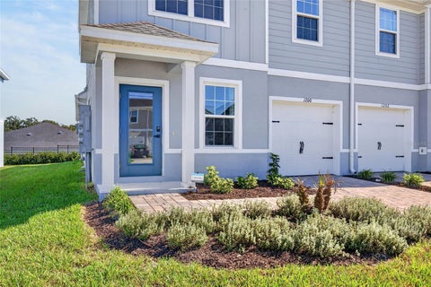 Photo of 1200 Port Blue Way, Lady Lake, FL 32159 (MLS # OM734439)