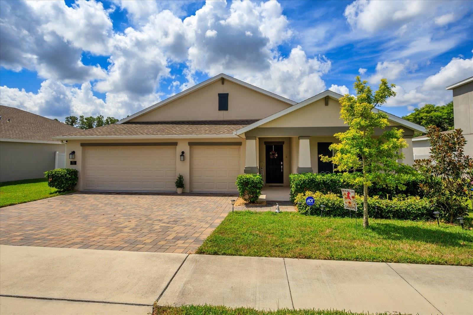 Better than new! This immaculate 4 year old home has so many upgrades, you won't have to do anything yourself - just move in! The split bedroom, open floor plan are great for entertaining.Upgrades on the exterior include an extended patio partially covered and screened, with concrete pavers and ceiling fans, where you can enjoy the view with no rear neighbors! There is a partial view of a pond and lake from the rear patio, and an additional paver patio for grilling or catching some sun! The kitchen has a large island with quartz counter-tops, white cabinets and a walk in pantry. Off the kitchen is the dining area and family/living room. A beautiful accent wall with an electric fireplace in the family room is just the place to put your feet up at the end of the day, a surround sound system is included. There is a flex room off the great room, perfect for an office/den or sitting area. The primary bedroom is over-sized with a large walk in closet and on suite bathroom. Here's what's been added to the interior: whole house water softener/purifier, reverse osmosis system for your drinking water. The HVAC system has a special filter for dust and allergens. The garage has been insulated and would make a perfect workroom or crafting space. Gutters on the exterior, in-wall pest control, and a whole house security system provide you with peace of mind. The location of the house is near the Cherry Lake Park and Playground, there is a new school nearby - Cherry Lake Preparatory Academy. Clermont and the Central Florida area provide opportunities for everyone to enjoy. There are miles of trails for running or bike riding, triathlons and community events. Clermont hosts Food Truck Fridays on the first Friday of each month, Sundays in downtown provide opportunities to shop at the farmer's market. The local lakes provide opportunities for boating, kayaking, or just a drink at a local restaurant watching the sunset on the water.