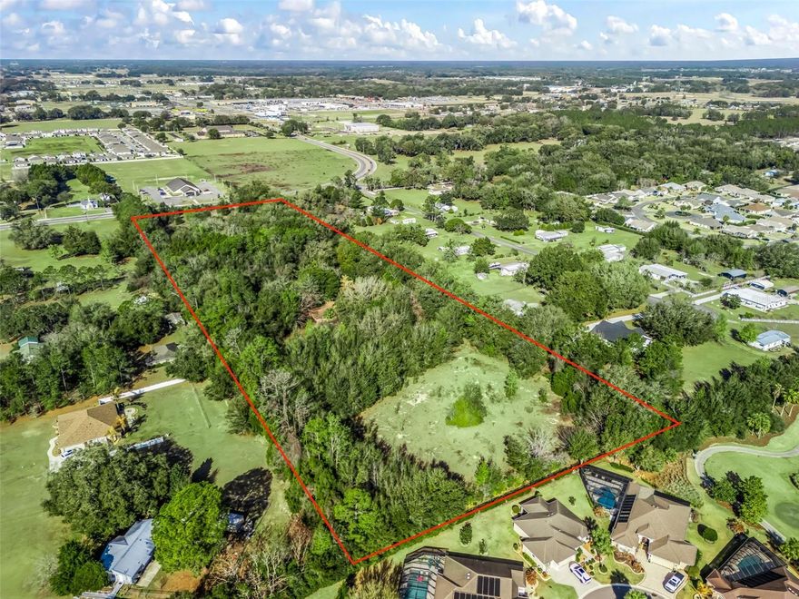 10± acre strategic corridor opportunity located on E County Road 462 in Wildwood, positioned within one of the most actively expanding growth corridors serving The Villages and surrounding communities. Featuring approximately 300 feet of frontage with strong visibility and consistent daily traffic flow, this site sits directly in the path of continued residential and commercial expansion. Surrounding properties along CR 462 have undergone successful rezoning and redevelopment, signaling a clear transition from rural to higher-intensity uses. Water and sewer utilities are available in close proximity to the site, further supporting the area’s ongoing development trajectory. This property presents a compelling long-term land position for investors or developers seeking to participate in the corridor’s evolution. Currently zoned RR (Rural Residential). Any higher-density residential, mixed-use, or commercial development will require rezoning and approval by the appropriate governing authority. Buyer to conduct all due diligence regarding zoning, future land use, utilities, access, and development feasibility, and the owner will allow a reasonable due diligence period. An existing residential structure is located on the property and conveys. Property is offered as-is. Seller will not pursue rezoning or development entitlements.