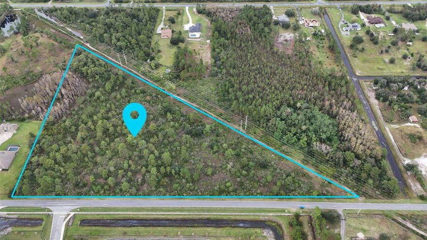 Exciting development opportunity in Wedgefield. This 10+ acre property is perfectly positioned in a thriving community near major highways, shopping centers, and recreation. Just 20 minutes to Orlando International Airport and Lake Nona, in proximity to downtown Orlando. Features include a community golf course, clubhouse, and skate park. Buyer to verify lot measurements. Ready to explore? Schedule a showing today.