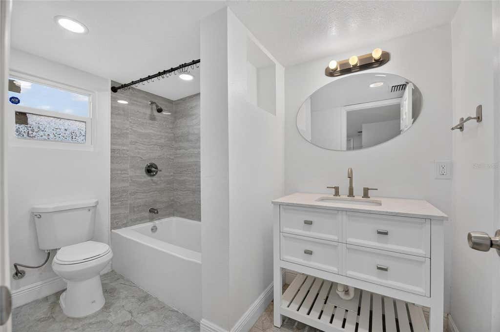Photo of 10004 N 25th Street, Tampa, FL 33612 (MLS # TB8523856)