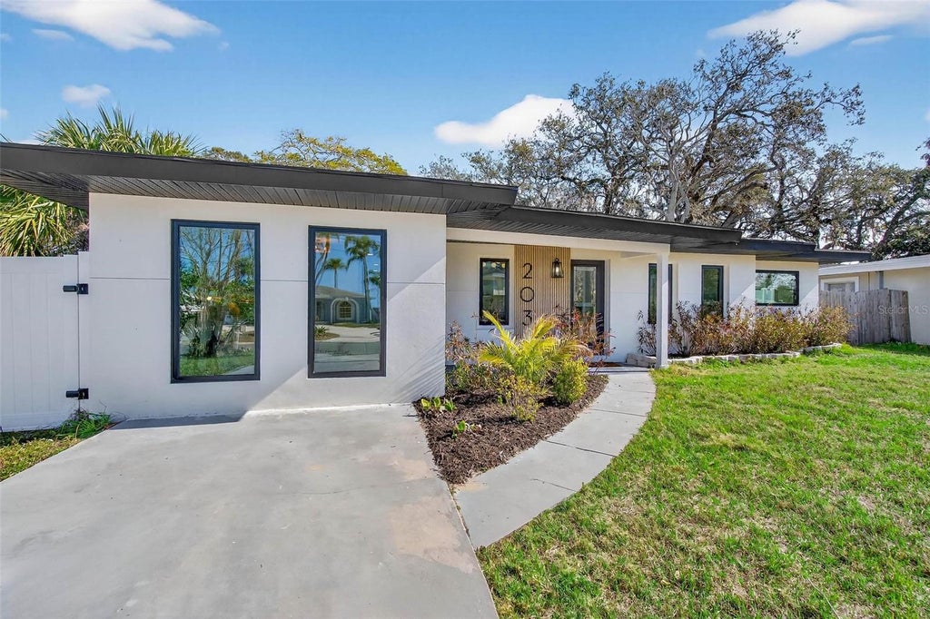 Photo of 203 Driftwood Drive W, Palm Harbor, FL 34683 (MLS # TB8523151)