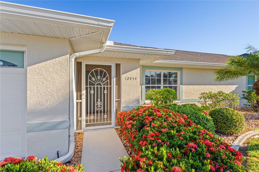 Photo of 12454 SW Kingsway Circle #202, Lake Suzy, FL 34269 (MLS # A4668416)