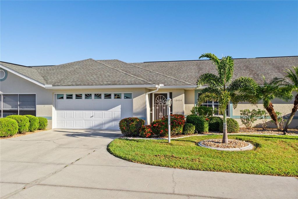 Photo of 12454 SW Kingsway Circle #202, Lake Suzy, FL 34269 (MLS # A4668416)