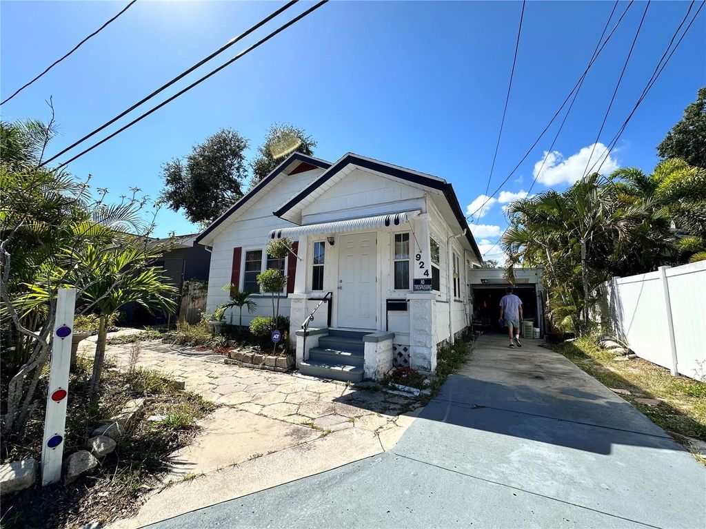 Photo of 924 Dartmoor Street N, St Petersburg, FL 33701 (MLS # TB8439576)