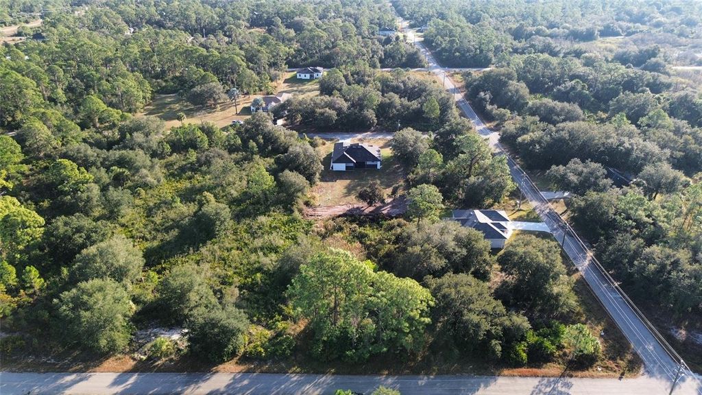 Photo of 1502 Acacia Avenue, Lehigh Acres, FL 33972 (MLS # O6393770)