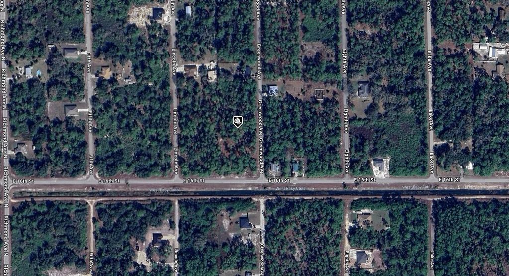 Photo of 1605 Greenwood Avenue, Lehigh Acres, FL 33972 (MLS # A4663213)