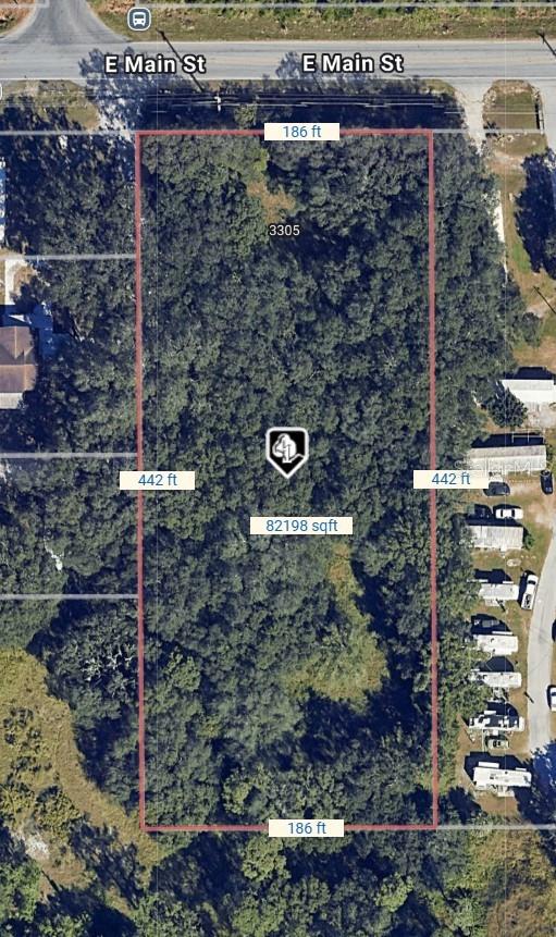 1.89 Acre Zoned Multi-Family - potential up to 16 units can be built. High & Dry mostly cleared land. Septic needed, sewer connections are currently about .7 miles away but business park is being built that should bring it closer. 8" water connection available at the road. Attached drawing was approved thru county planning. 2 Quadplex buildings are pre-approved to be built. Each unit had 2 beds/2 bath + den. Additional could be added or change the plan to duplex units if desired. Main traffic road with lots of employment opportunities and major highways near by. No HOA - Not in City Limits.