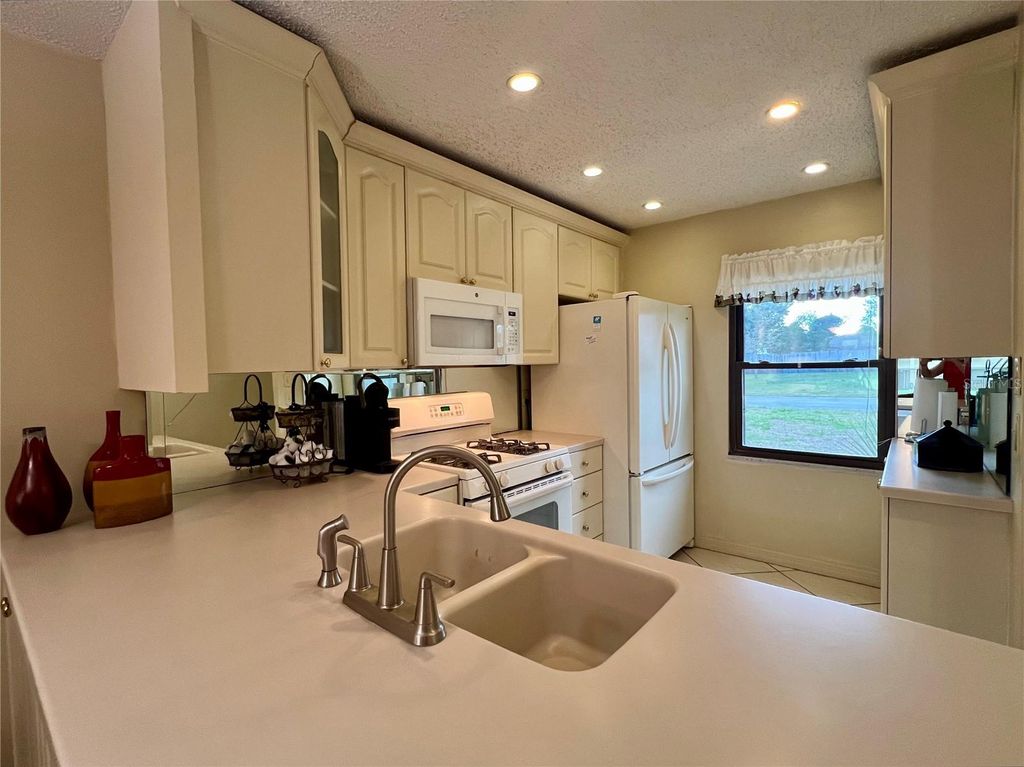 Photo of 1395 Mission Drive W #28C, Clearwater, FL 33759 (MLS # TB8485693)