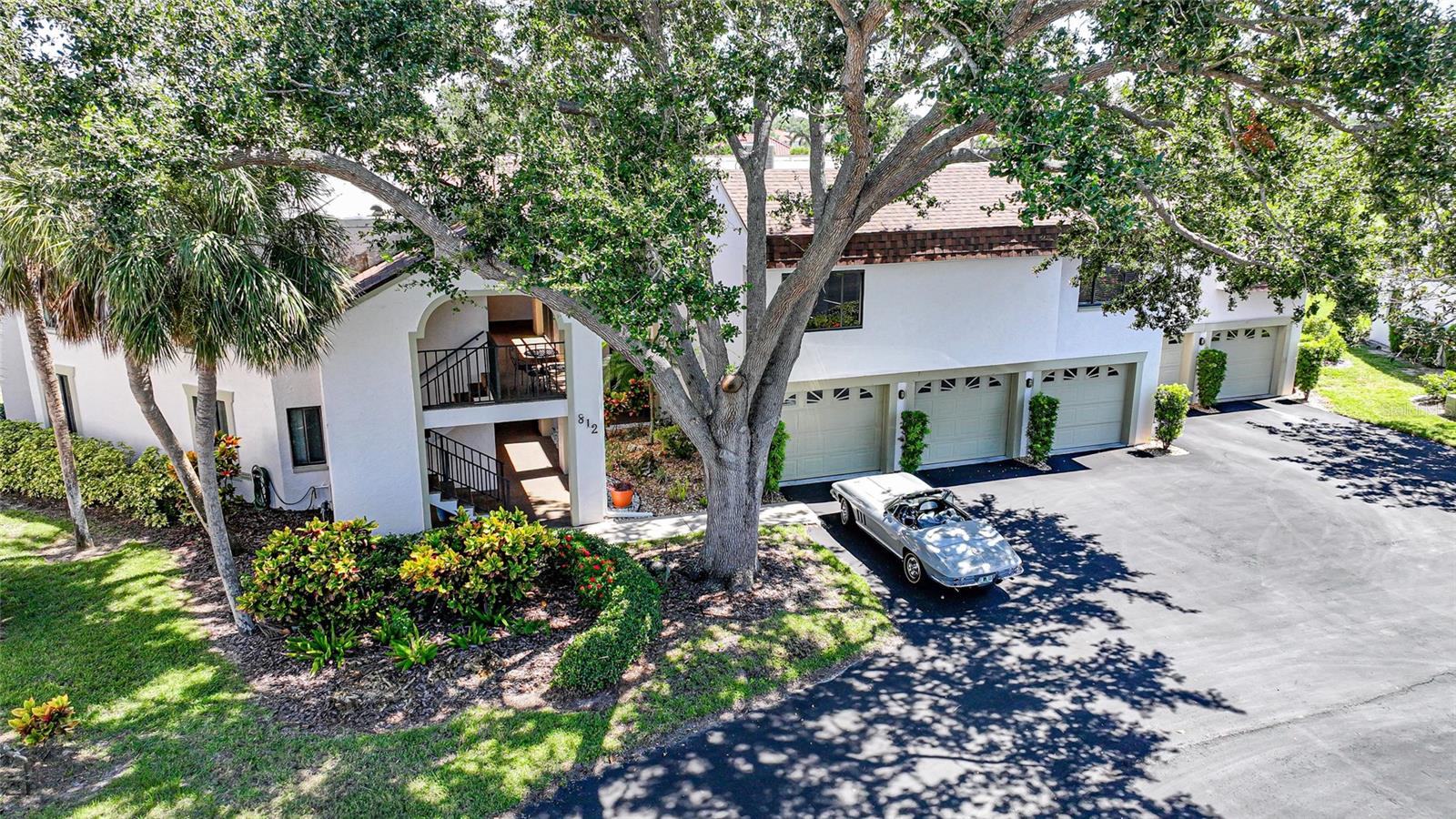 Welcome to this beautifully maintained, first-floor, turnkey two-bedroom, two-bath condo with a 12x24 one-car garage with storage, nestled in the highly desirable Summer Green community within the Capri Isles Golf Neighborhood in Venice, Florida. Ideal for year-round living or as a seasonal retreat, this home is offered fully furnished and move-in ready. Step inside and immediately notice the warm, inviting ambiance of the wood-look tile flooring that flows throughout the home. Neutral tones and an open layout create a welcoming atmosphere, with the living room seamlessly connecting to the dining area and kitchen. The updated kitchen is a true centerpiece, featuring sleek granite countertops, a stylish subway tile backsplash with mosaic inlay, and crisp white cabinetry with soft-close drawers. Stainless steel appliances, including a smooth-top range and built-in microwave, combine modern functionality with visual appeal. Recessed lighting brightens the space, while a convenient pass-through window to the dining and living areas enhances the open, airy flow—perfect for everyday living and entertaining. A full-size washer and dryer are conveniently located in the hall closet. The spacious primary bedroom is light and bright, complete with a large walk-in closet and an attached full bathroom. The guest bedroom offers easy access to its own bath, featuring a walk-in shower with pebble flooring. Sliding glass doors off the dining area bring in abundant natural light and open to the screened-in lanai and outdoor patio, where you can unwind while enjoying tranquil views of the surrounding golf course and pond, home to a variety of birds. Additional update of a new building roof in 2023. You’ll be impressed with this meticulously cared-for condo in the distinctive Summer Green community, just 2.5 miles from downtown Venice Island and 3.5 miles to Venice Beach. Each building features only five individual units—two on the first floor and three on the second—nestled throughout scenic grounds framed by the Capri Isles Golf Club. The community is highlighted by serene ponds, majestic oak and palm trees, charming wooden bridges, two inviting pools, tennis/pickle board court, club areas with work out areas for owners and their guests and sweeping golf course views across much of the property. Close to beautiful Gulf beaches, Legacy bike trails, entertainment, great restaurants, I75, hospitals, shopping and so much more.
**PLEASE ENJOY THE 3D INTERACTIVE VIRTUAL TOUR ASSOCIATED WITH THIS LISTING**