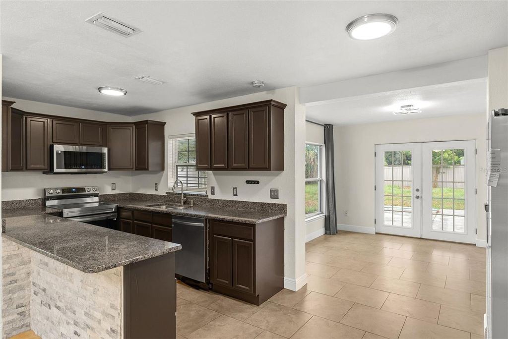 Photo of 5770 Crane Place, Orlando, FL 32807 (MLS # TB8434783)