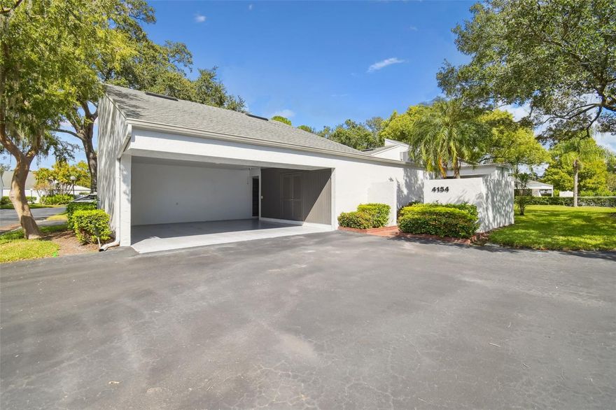 Amazing opportunity to live in the highly desired Northmeadow Cluster Homes. This meticulously maintained unit is move in ready! Enter through your private court yard. Inside you will immediately notice the beautiful engineered hardwood floors and high ceilings. A perfect floor plan with two bedrooms at either end of the unit. The spacious primary suite has multiple closets, ensuite bathroom with dual sinks )and opens onto the massive covered and screened patio (11x18). The living room also opens onto the patio via oversized sliding doors. The living area is perfect for relaxing while enjoying the view out the back over an expansive greenspace and community pool. The kitchen contains beautiful solid wood cabinets, granite counter tops and stainless steel appliances. The second bedroom has massive closet space as well as an ensuite bathroom that has a tub/shower combination. The step down family room has beautiful ceramic tile and lots of light provided by the overhead skylight. Don't miss the large storage room in the carport area!
Northmeadow Cluster Homes is an impeccably maintained community just minutes away from the Carrollwood Country Club that has state of the art fitness center, Olympic size swimming pool, tennis and of course the beautiful Carrollwood Golf Course! Living here also gives you access to all the amenities that Carrollwood Village has to offer - parks, gardens, playground, dog park and more! Located in the heart of Carrollwood with abundant shopping, dining and entertainment options. Don't miss this opportunity!