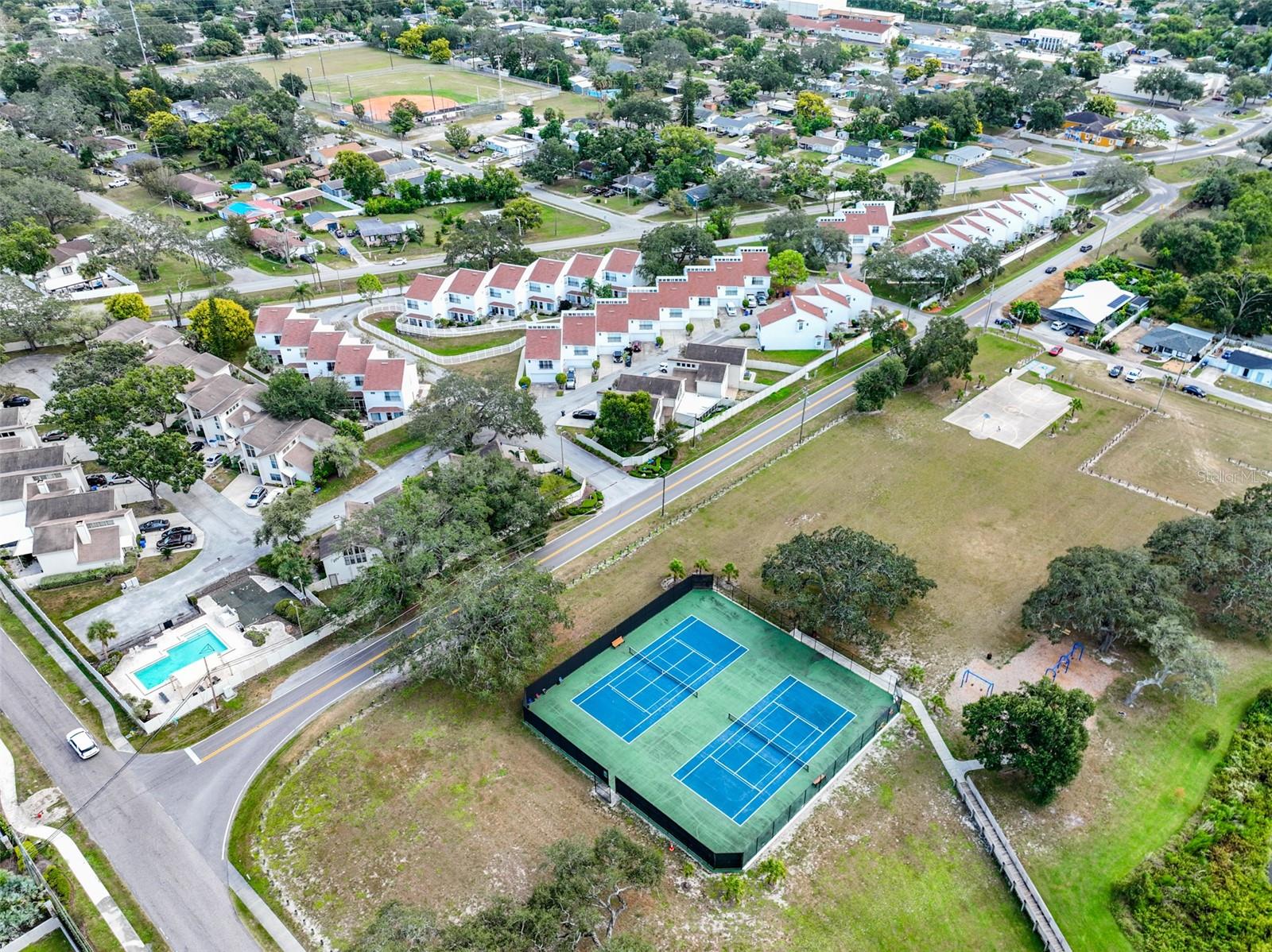 NEW TRIAD TOWNHOMES OF CARROLLWOOD - Residential