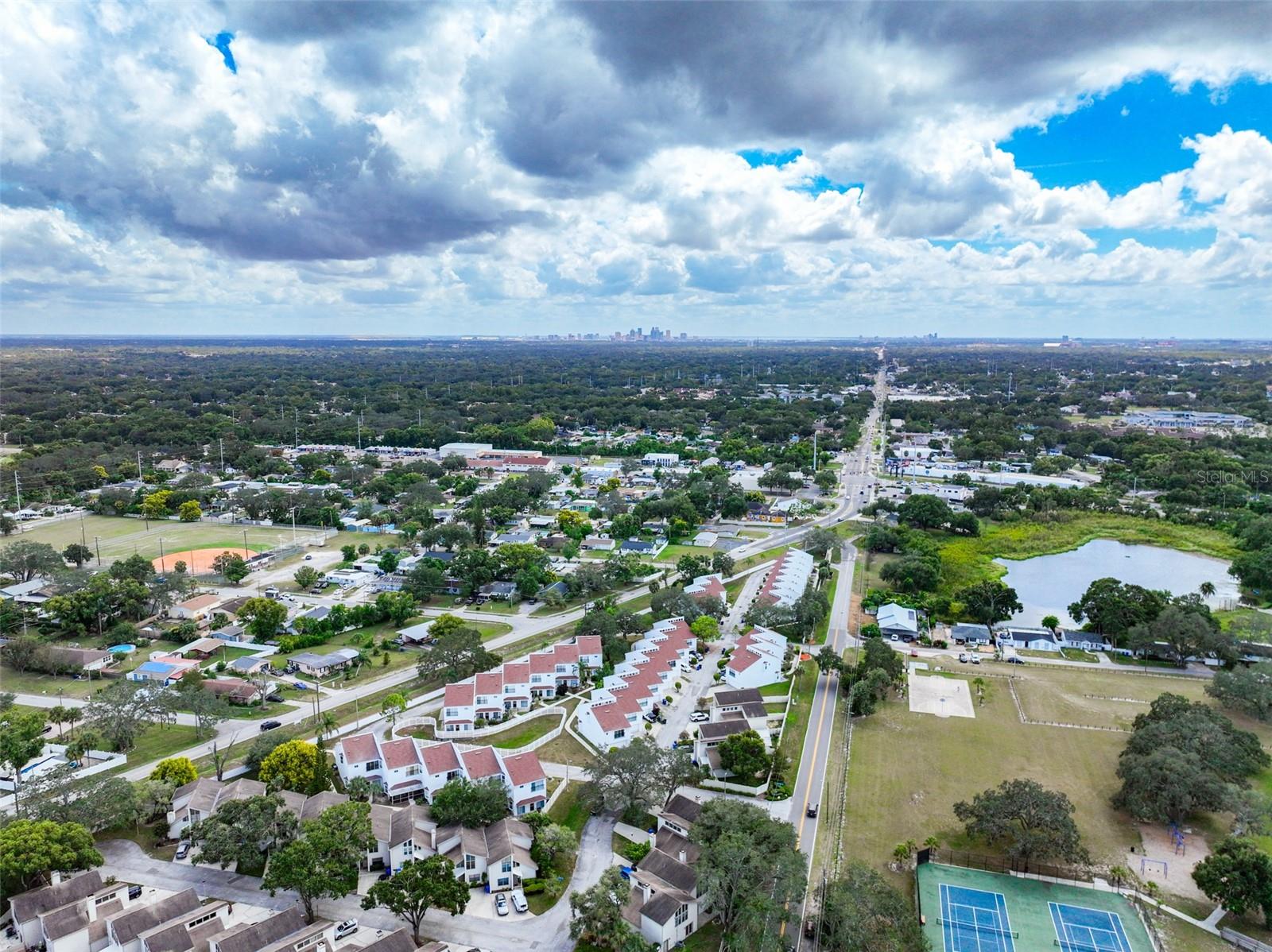 NEW TRIAD TOWNHOMES OF CARROLLWOOD - Residential