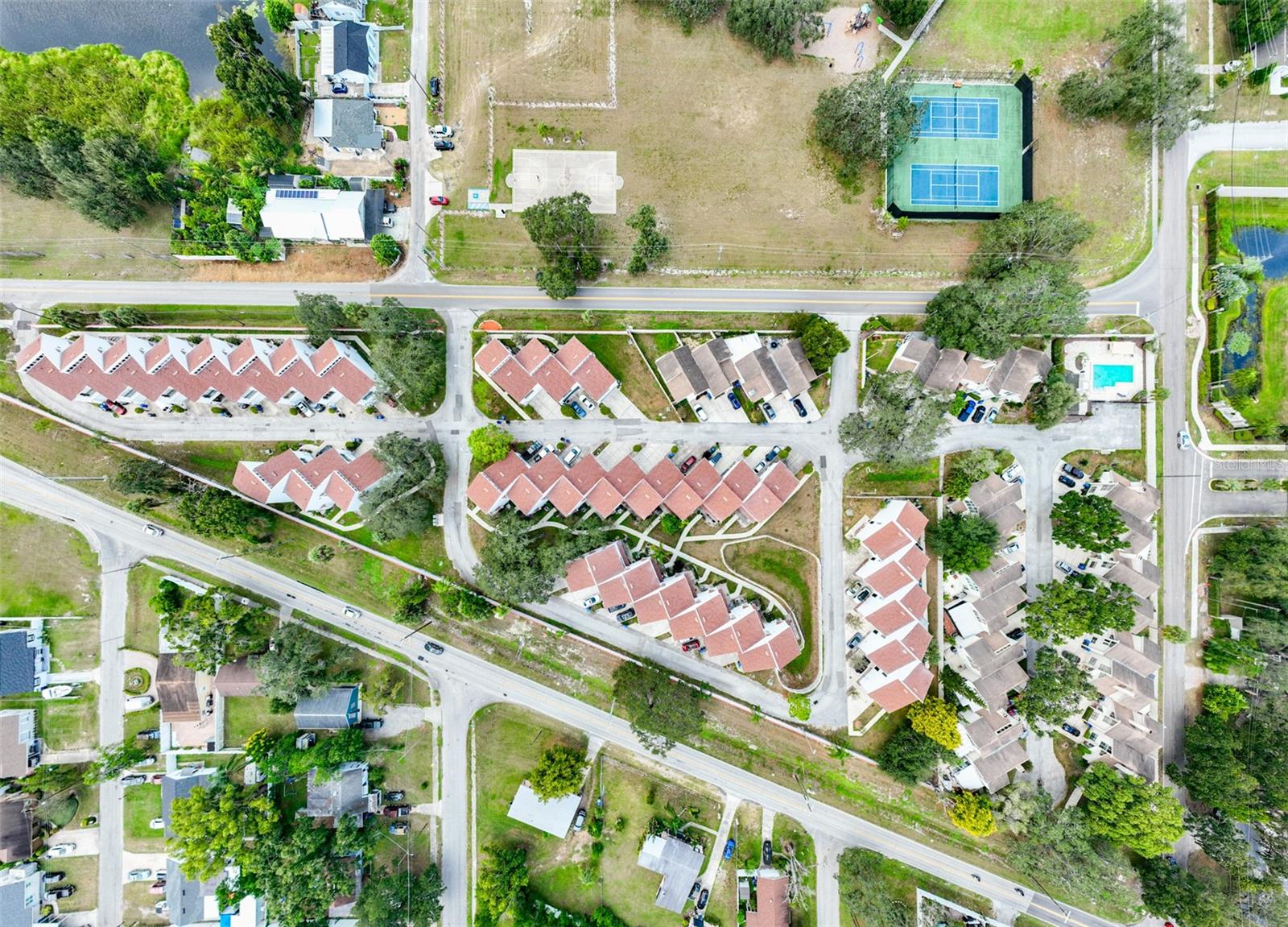 NEW TRIAD TOWNHOMES OF CARROLLWOOD - Residential
