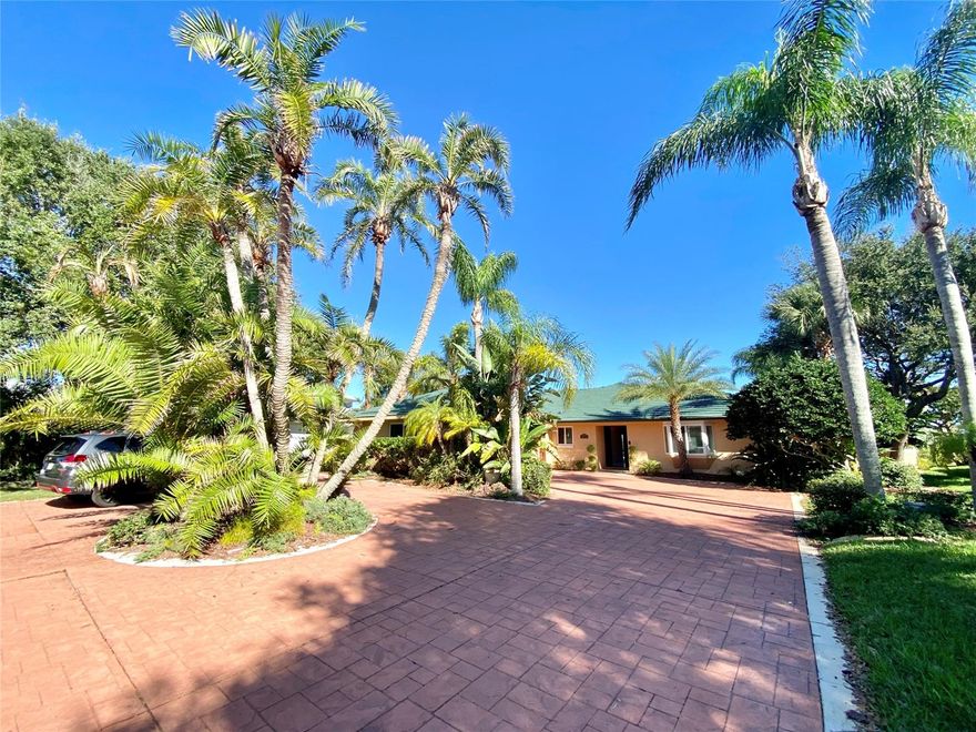 A rare 3 Bed 3 Bath W/Office Waterfront on a coveted street in the most desired neighborhoods in Volusia county close to some of the best dining in the area. Just a quick hop to the inlet. Location is everything when it comes to this S/W facing home at the mouth of the intra-coastal running E/W behind home that includes a boat house with lift under roof, composite decking on the dock W/2 more docks for boats. Marble floors in Kitchen and hallways. Ceramic tile in living and family room. All bedrooms have their own bathrooms which were updated 2 yrs ago. Outside natural stone wet bar (covered), Jacuzzi tub, in-ground pool with amazing views and travertine deck. Large drive around stamped concrete driveway. Hurricane proof windows & garage door 2 yrs ago. A/C garage 50 yr metal roof.

Sitting at the pool of the dock you will enjoy amazing views of sunrises & sunsets as well as the mangrove preserve that will forever remain undeveloped catering to an abundance of wild life. Dolphins, Manatee's, birds, etc. All the while fishing off the dock, and next to one of the best red fish spots on the river as well as 110 foot of seawall frontage. 

Overhead ceiling heaters in all bathrooms, premium outdoor speaker system, vinyl garage covered floor, and AC replaced in 2019. Outdoor enclosed shower. ;Water: City