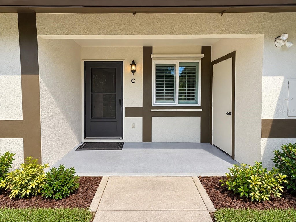 Photo of 2900 Grovewood Boulevard E #C, Palm Harbor, FL 34683 (MLS # TB8548699)