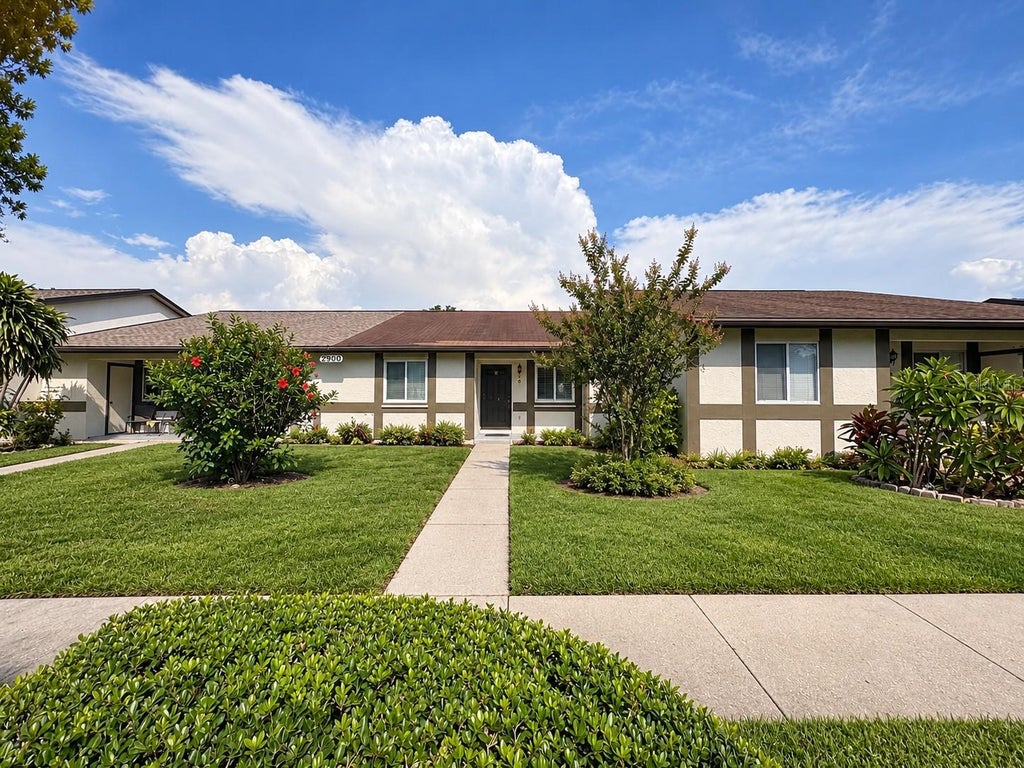 Photo of 2900 Grovewood Boulevard E #C, Palm Harbor, FL 34683 (MLS # TB8548699)
