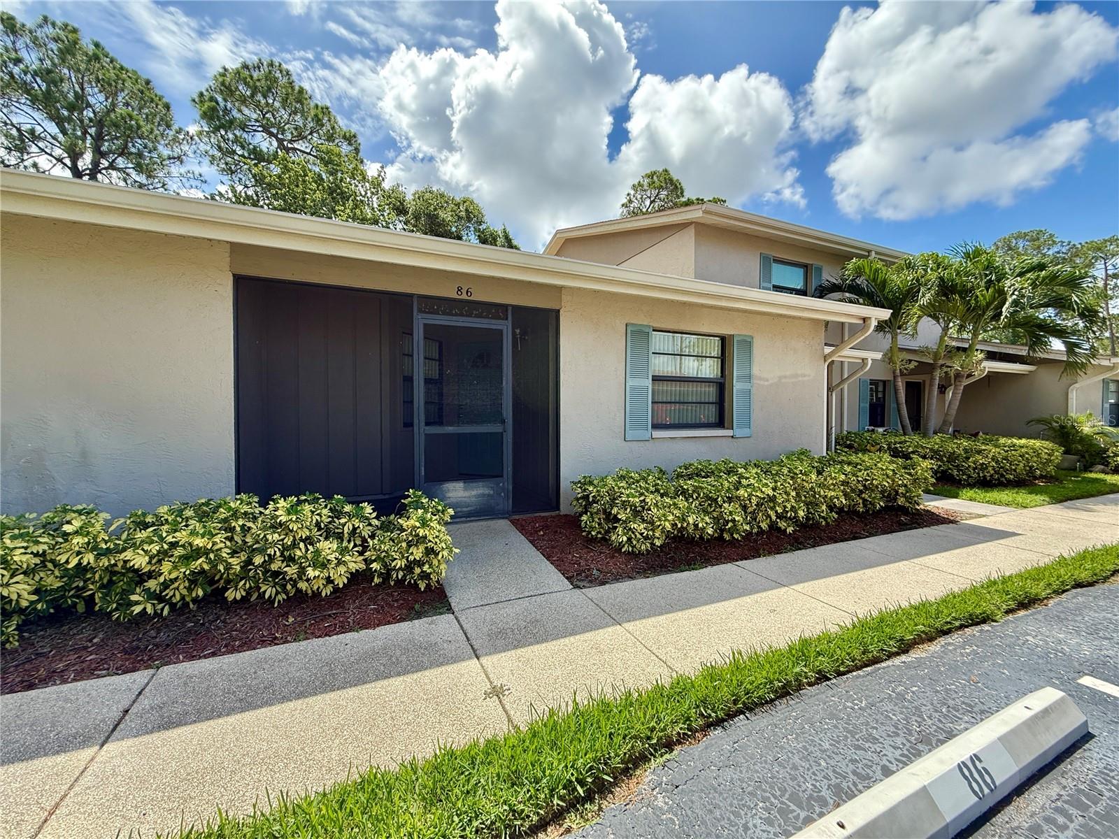 Welcome to 2131 Ridge Road South, Unit 86, located in the heart of Largo, FL. This beautifully maintained 2/BDR, 2/BTH villa offers a perfect blend of comfort and convenience. Step inside to find a spacious, open living area with vaulted ceilings and updated laminate flooring, creating a warm and inviting atmosphere. The eat-in kitchen features neutral cabinetry, modern lighting, and plenty of space for cooking and entertaining. Both bedrooms are generously sized, with the primary suite offering a private en-suite bath. Enjoy the Florida lifestyle year-round on your private screened patio, ideal for relaxing or dining al fresco. The home also includes indoor laundry hookups for added convenience. Situated in a friendly community, residents enjoy access to amenities such as a sparkling outdoor pool, tennis and pickleball courts, and pet-friendly policies with no breed or size restrictions. The location is equally impressive, with shopping, dining, and entertainment all close by. Just minutes from the property, you'll find grocery stores like Quality Foods Market and local favorites such as Forchetta Italian Eatery, The Crying Tiger for Thai cuisine, and Schooners for casual waterfront dining. A short drive brings you to Clearwater Beach and Sand Key, where you can enjoy premier restaurants like Columbia Restaurant and E&E Stakeout Grill. Outdoor enthusiasts will love being near the Pinellas Trail, perfect for biking, jogging, or a peaceful walk. With easy access to beaches, parks, and everyday essentials, this rental offers the ideal balance of comfort, location, and lifestyle. Contact us today to schedule a tour and make this charming Largo villa your next home!